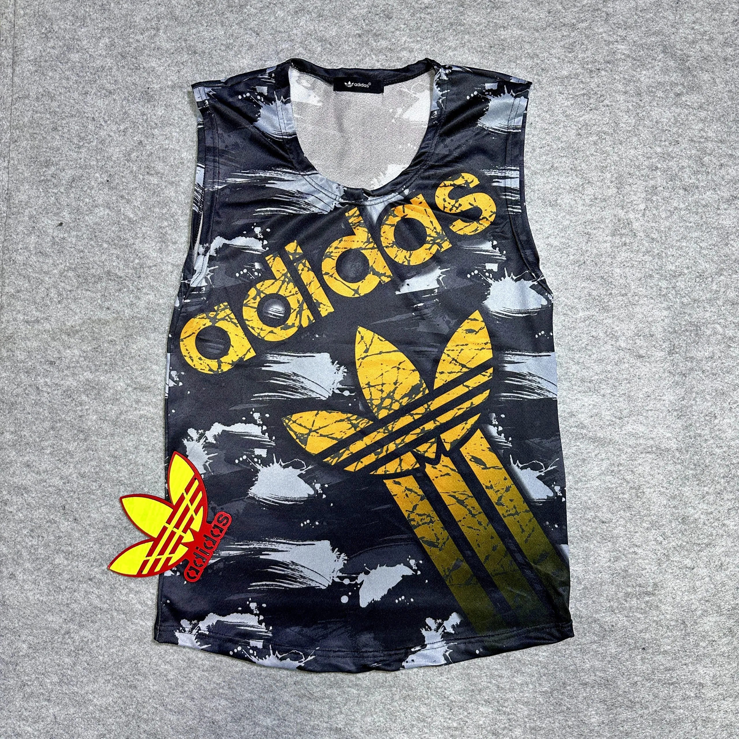 IMG_20230806_114457_890 تاپ ورزشی طرحدار طرح adidas کد 9B020 - Image 1